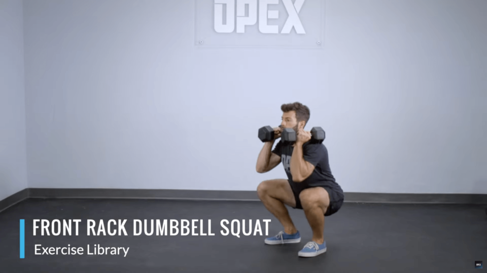 Man performing a dumbbell front squat exercise